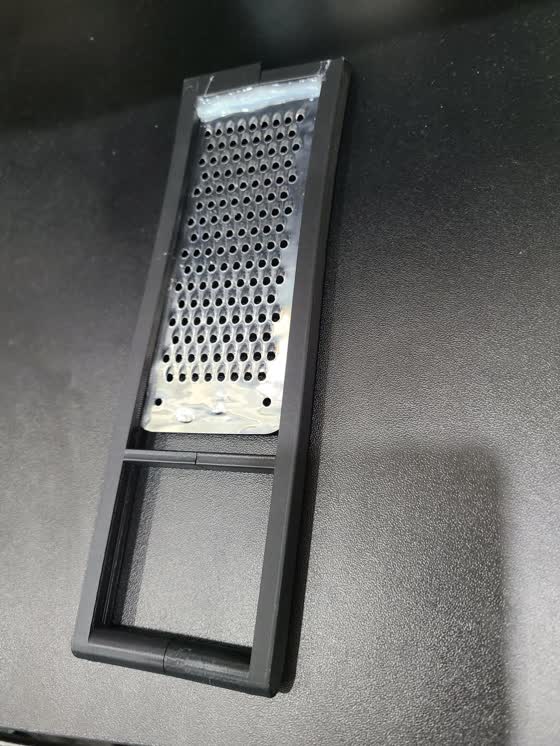 Assembled cheese grater